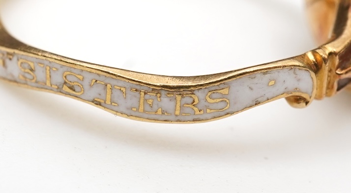 A rare and unusual George III amethyst and enamel mourning ring, late 18th century